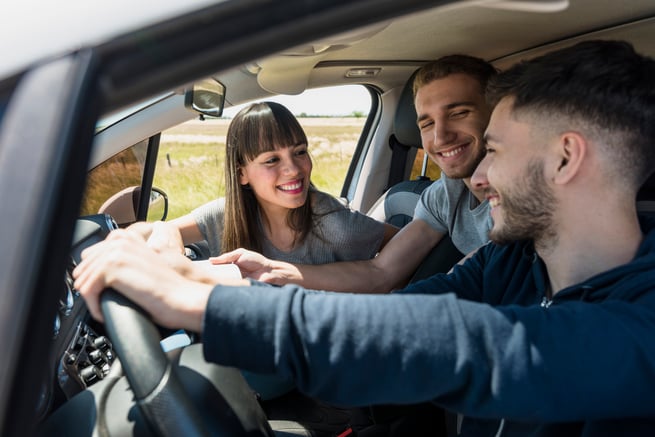 friends-having-fun-inside-car